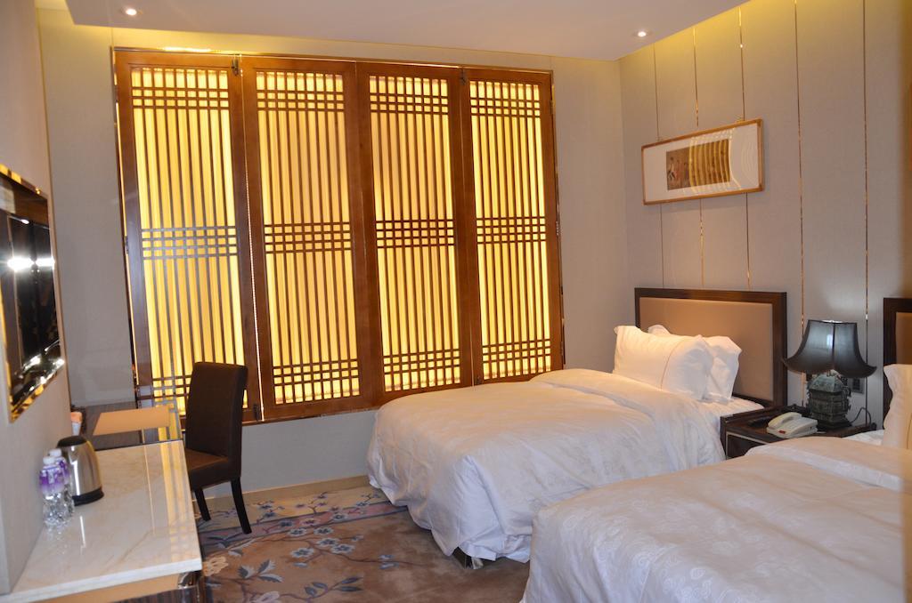 Beijing Palace International Hotel Пекин Стая снимка